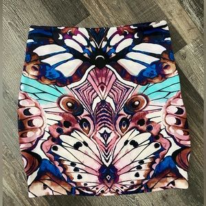 Bebe women’s peacock mini skirt size 2/4 small